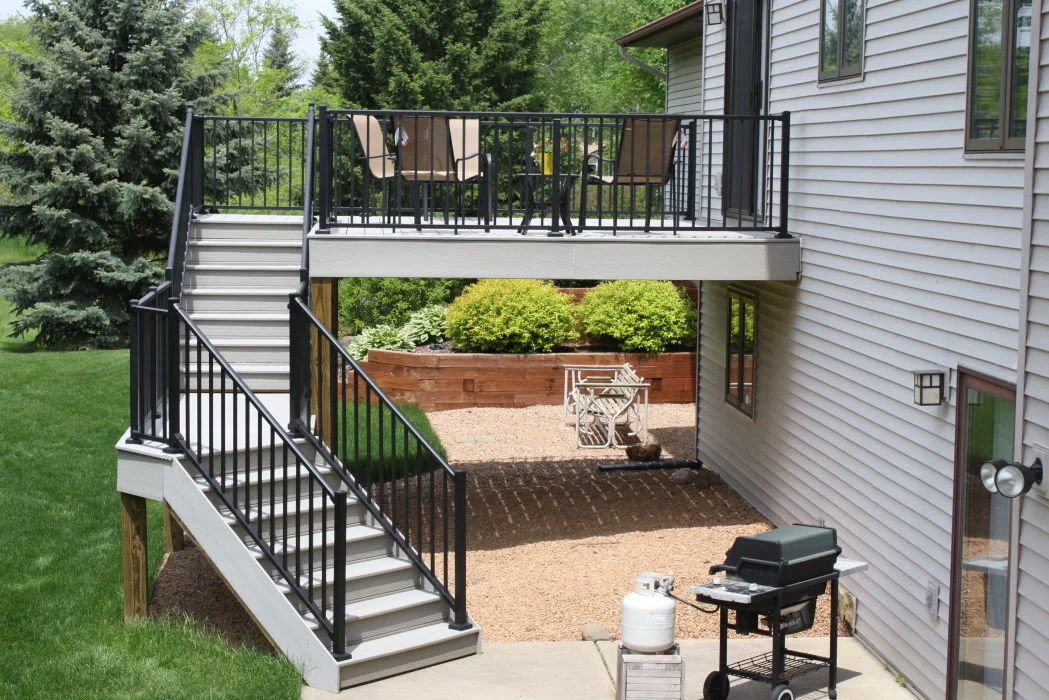 Deck railing and stair detail, cropped project photo from the company's own gallery